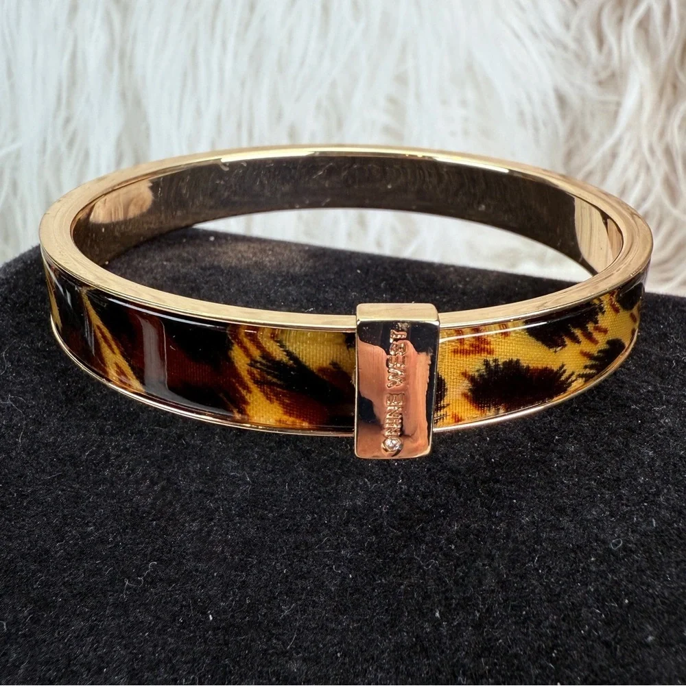 Beautiful, goldtone, animal print nine west bangle bracelet
